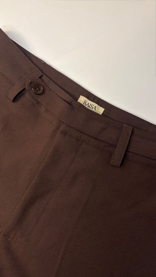 Close-up of Muse straight leg trousers in coffee brown showing waistband, button fastening and KAISA inside logo label