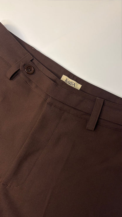 Close-up of Muse straight leg trousers in coffee brown showing waistband, button fastening and KAISA inside logo label
