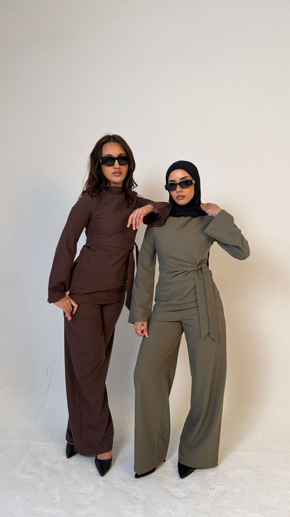 Two models facing forward wearing Muse straight leg trousers in olive green and the other model is in coffee brown, tailored fit for petite frames