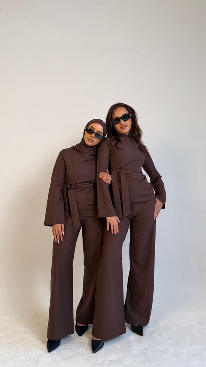Two models facing forward wearing Muse tailored tops in coffee brown, designed for petite frames with structured fit