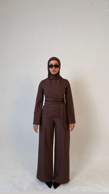 Model facing forward wearing Muse tailored top in coffee brown, designed for petite frames with structured fit